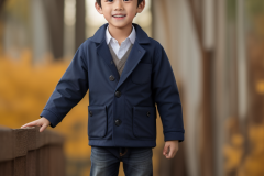 a-young-boy-in-a-blue-shirt-and-jeans